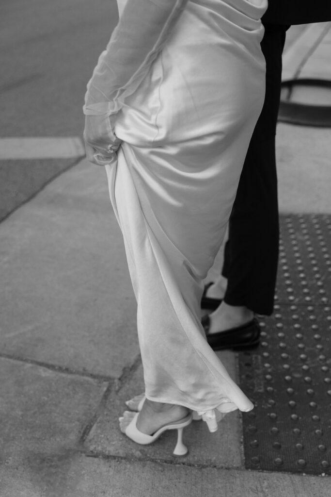 Black and white bridal dress detail.