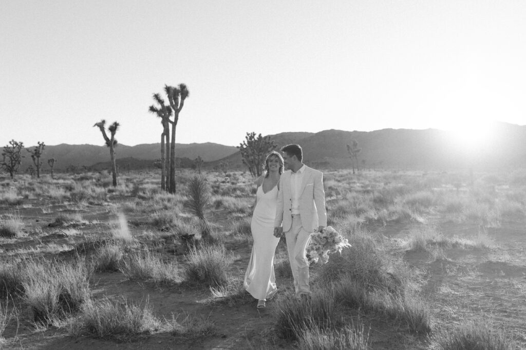 Dreamy desert elopement with bride and groom in Joshua Tree by Mariah Jones Photo wedding dress neutral florals documentary