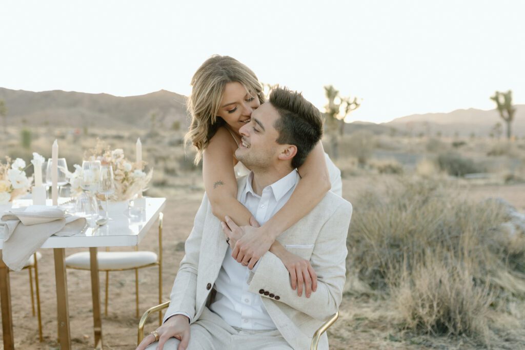 Dreamy desert elopement with bride and groom in Joshua Tree by Mariah Jones Photo wedding dress neutral florals documentary