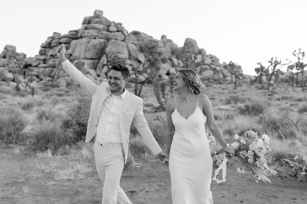 Dreamy desert elopement with bride and groom in Joshua Tree by Mariah Jones Photo wedding dress neutral florals documentary