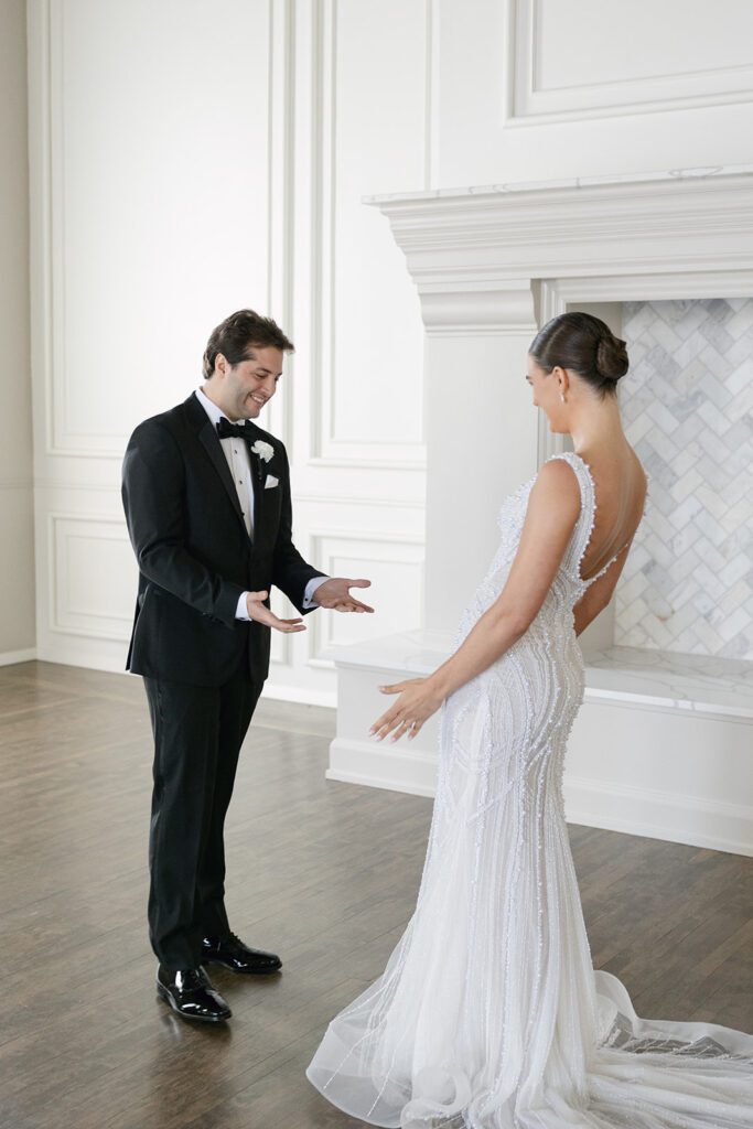 bride and groom first look at their st. james 1868 wedding