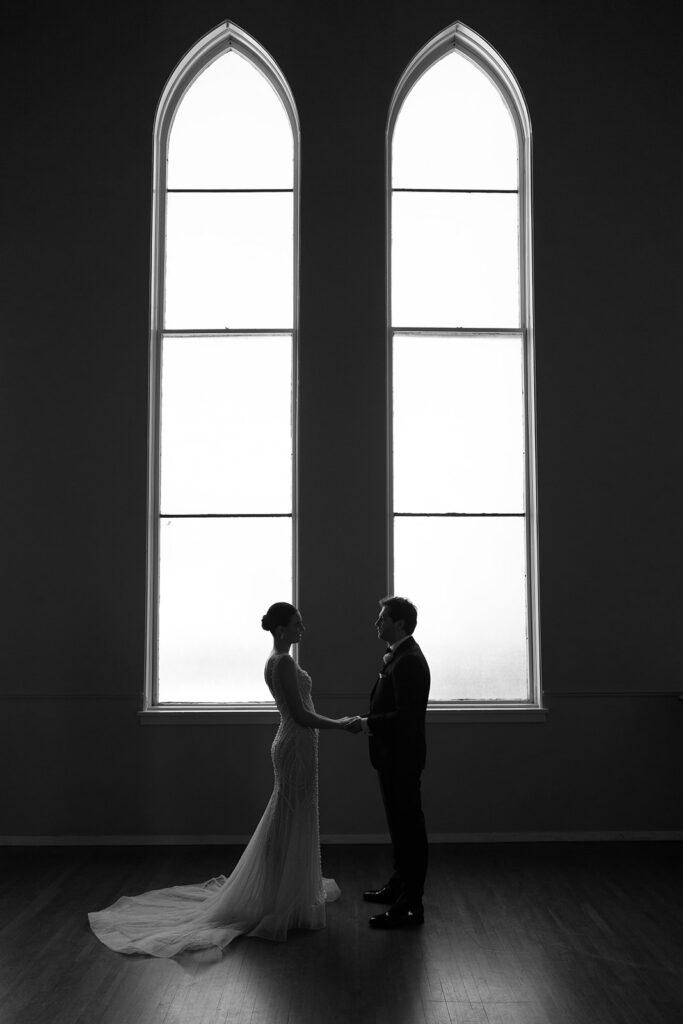 bride and groom first look at their st. james 1868 wedding