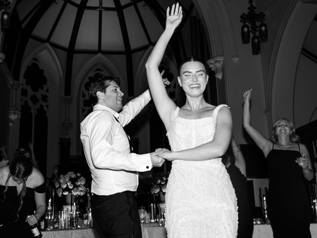 bride and groom dancing at their reception at st. james event center