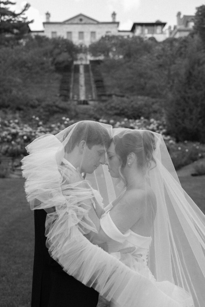 Close up black and white wedding portrait of the bride and groom at The Villa Terrace.