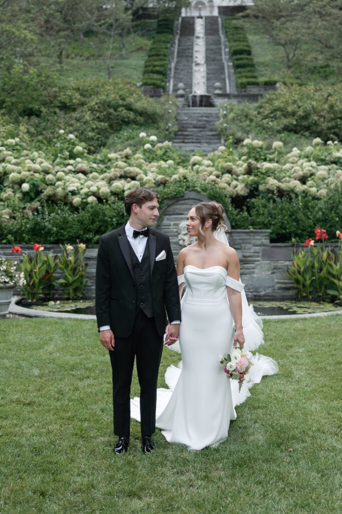 Bride and groom portraits on their wedding day in The Gardens at The Villa Terrace.