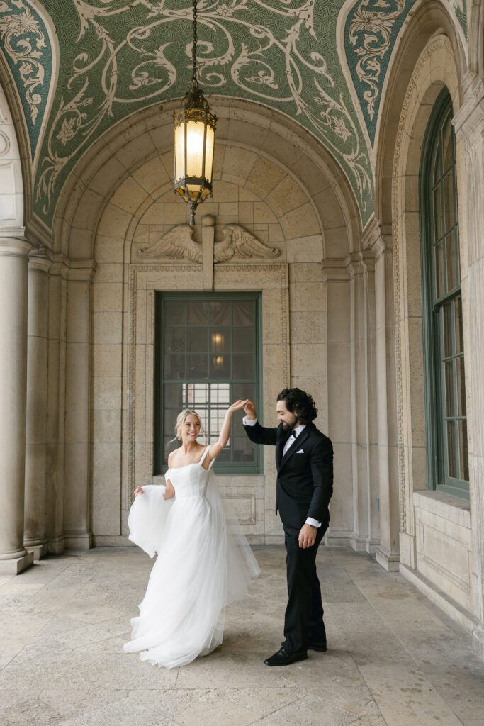 bride and groom on wedding day at Memorial Union in Madison