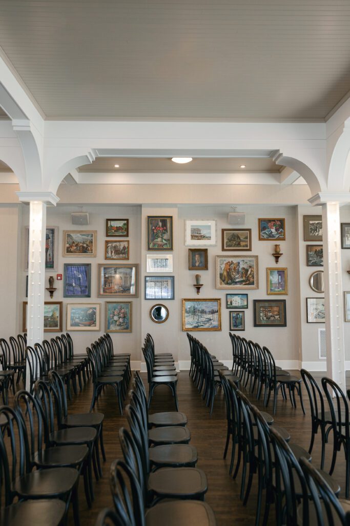 ceremony details featuring the gallery photo wall at The George and Madcap Lounge