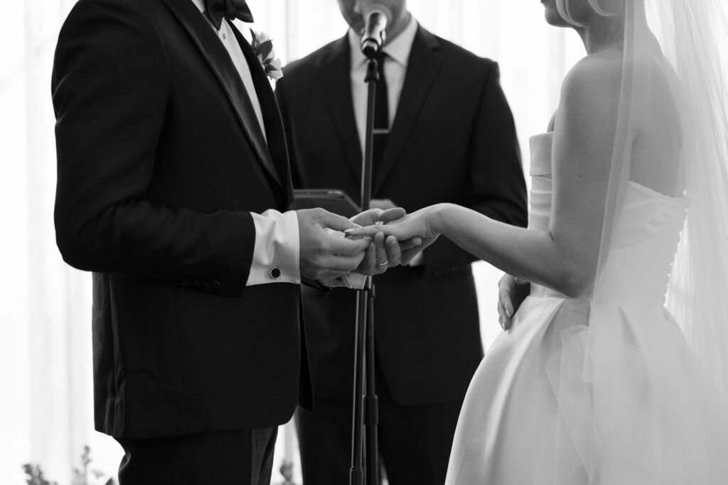 ring exchange during the ceremony at The George and Madcap Lounge