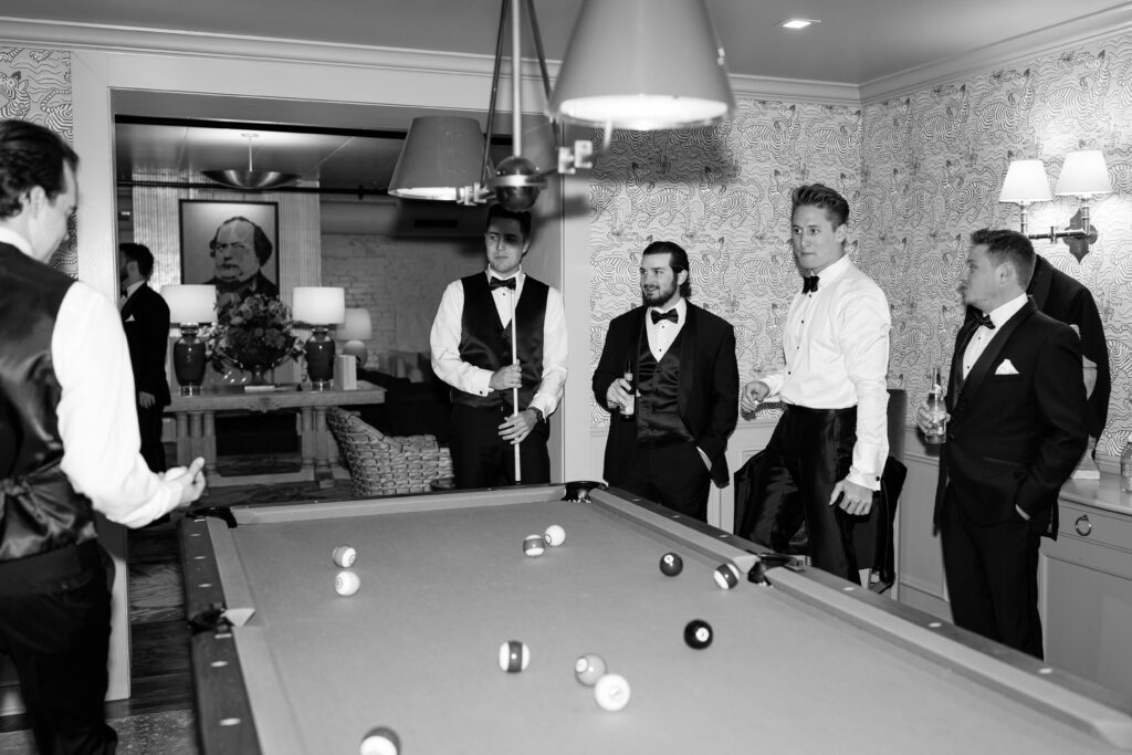 groomsmen playing pool at The George and Madcap Lounge with direct flash