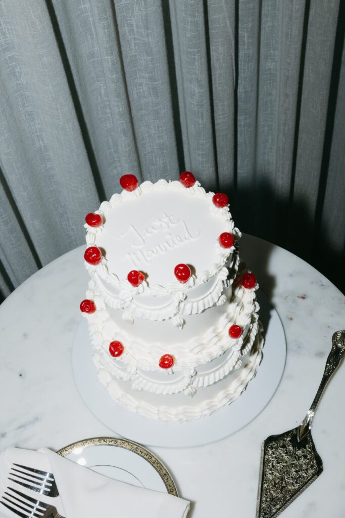 bride and groom cake cut at The George and Madcap Lounge