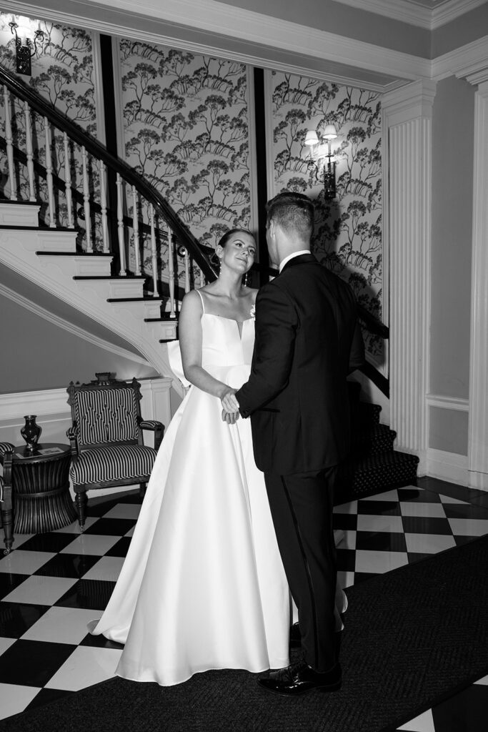 bride and groom sharing their first look at their madison club wedding