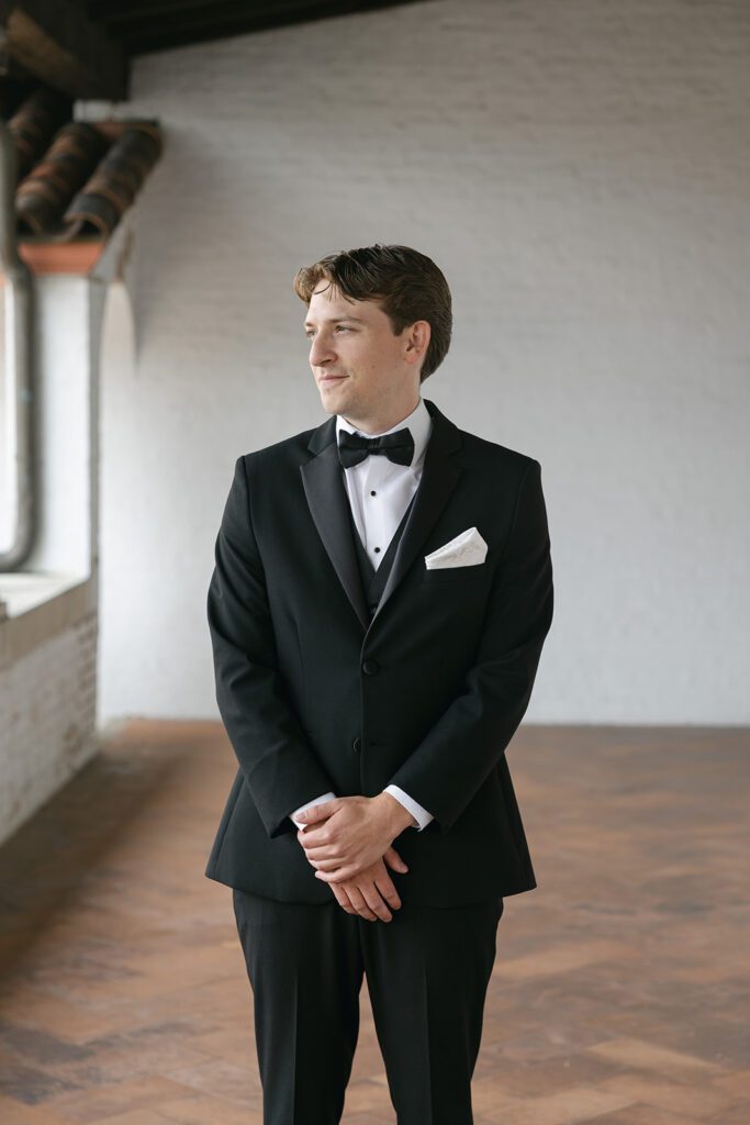 groom waiting on his bride at his milwaukee wedding