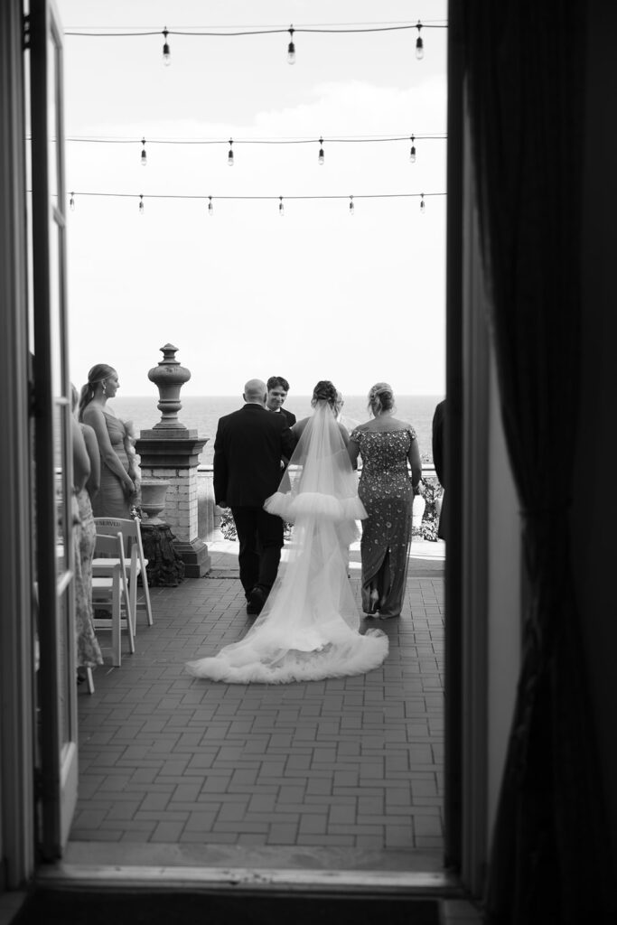 bride walking down aisle at the villa terrace in milwaukee, wisconsin