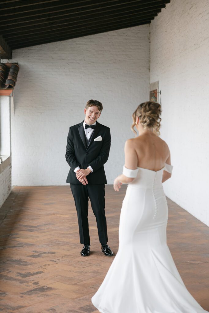 bride and groom first look at their villa terrace wedding in milwaukee, wi