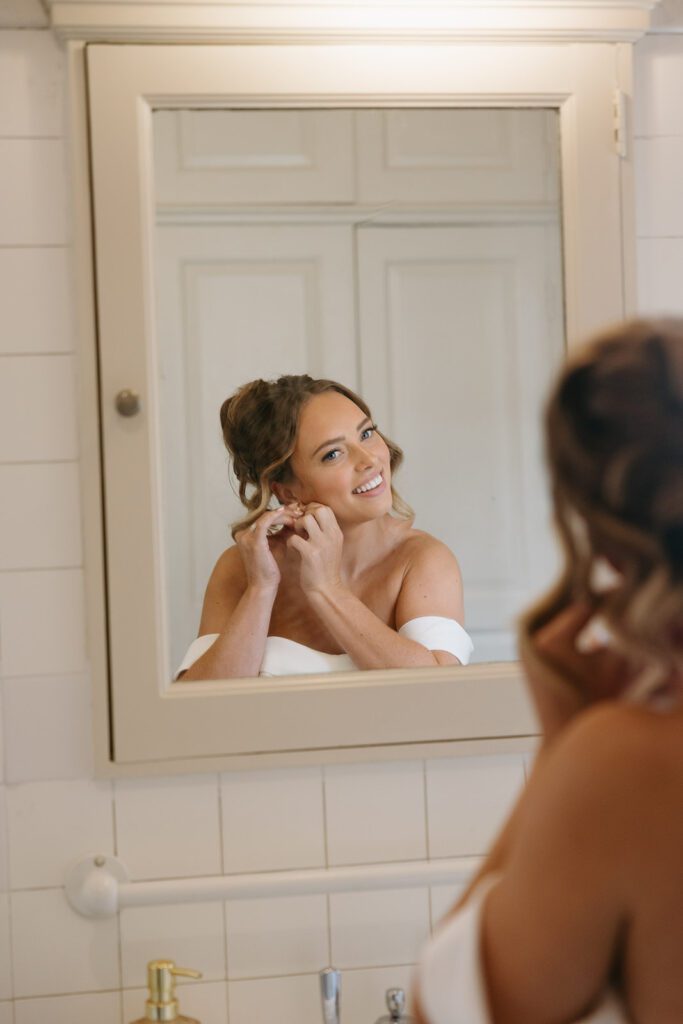 bride getting ready at her villa terrace wedding
