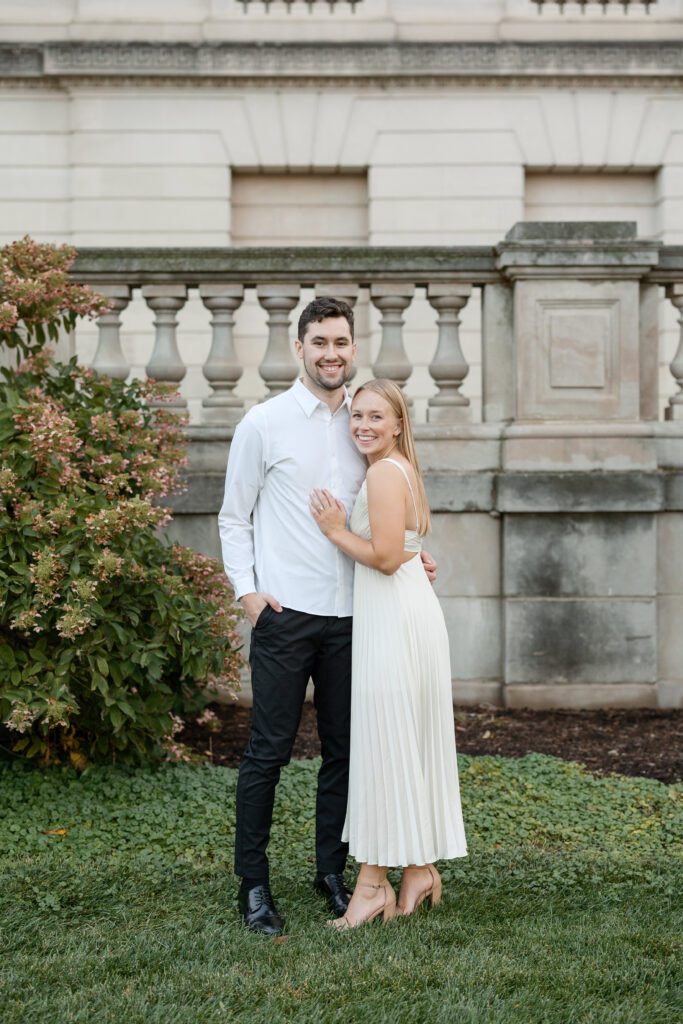 Couple poses for a portrait at their Memorial Union engagement session.