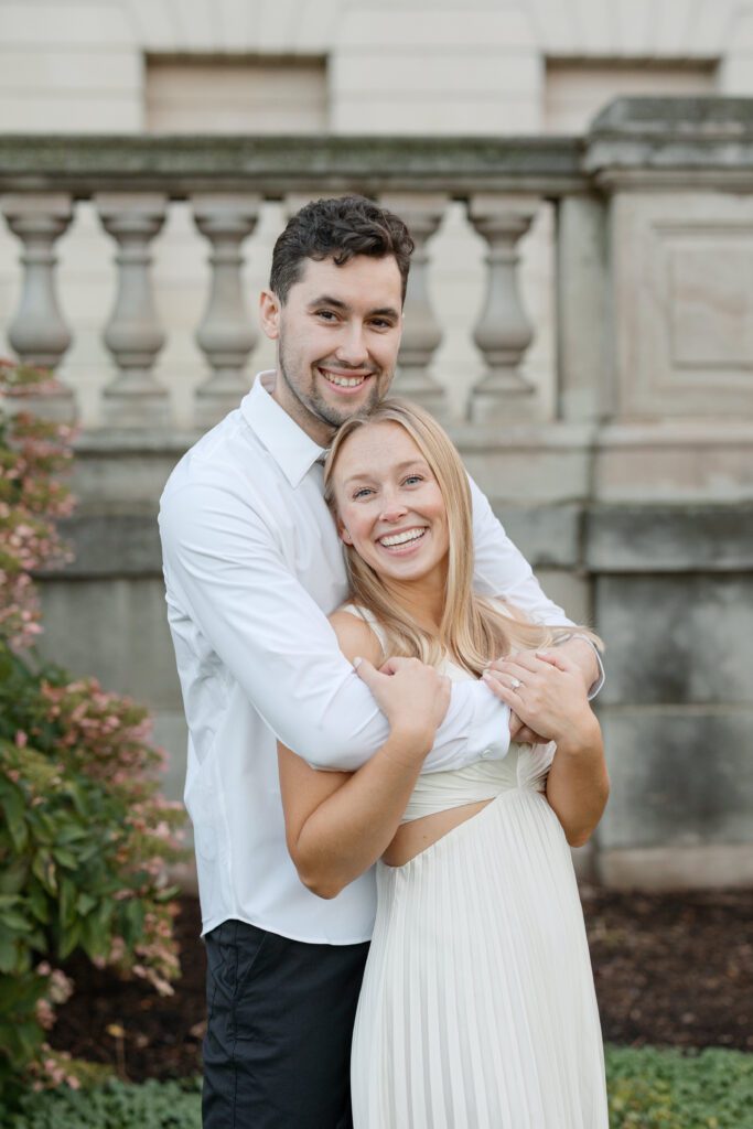 Engaged couple embracing warmly in a close-up portrait