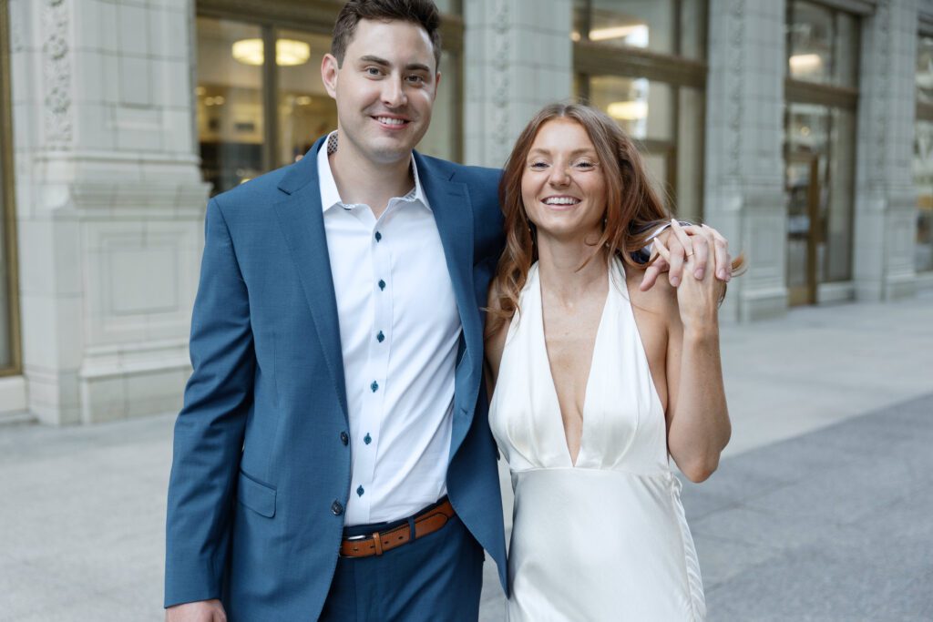 Couple walking towards the camera in downtown Chicago.