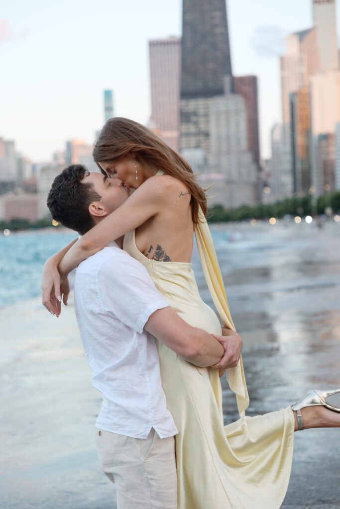 Couple kissing with Lake Michigan views at North Avenue Beach.