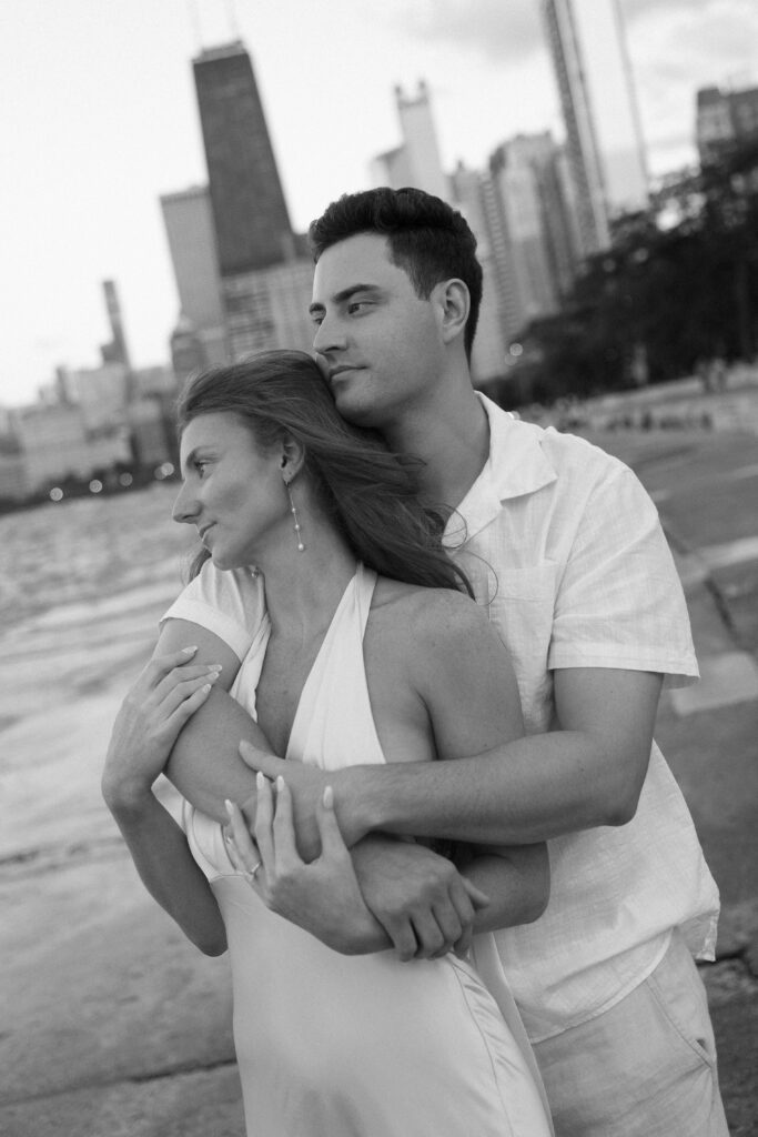 Portrait of couple embracing at their North Avenue Beach engagement session.