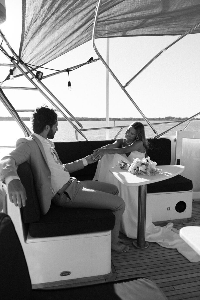 A beautiful portrait of the couple admiring one another, highlighting their deep connection during their West Palm Beach Boat Elopement.