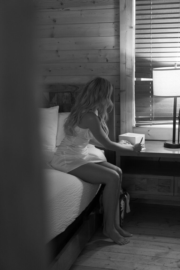 Bride getting ready at Mt. Princeton Hot Springs wedding suite with mountain views
