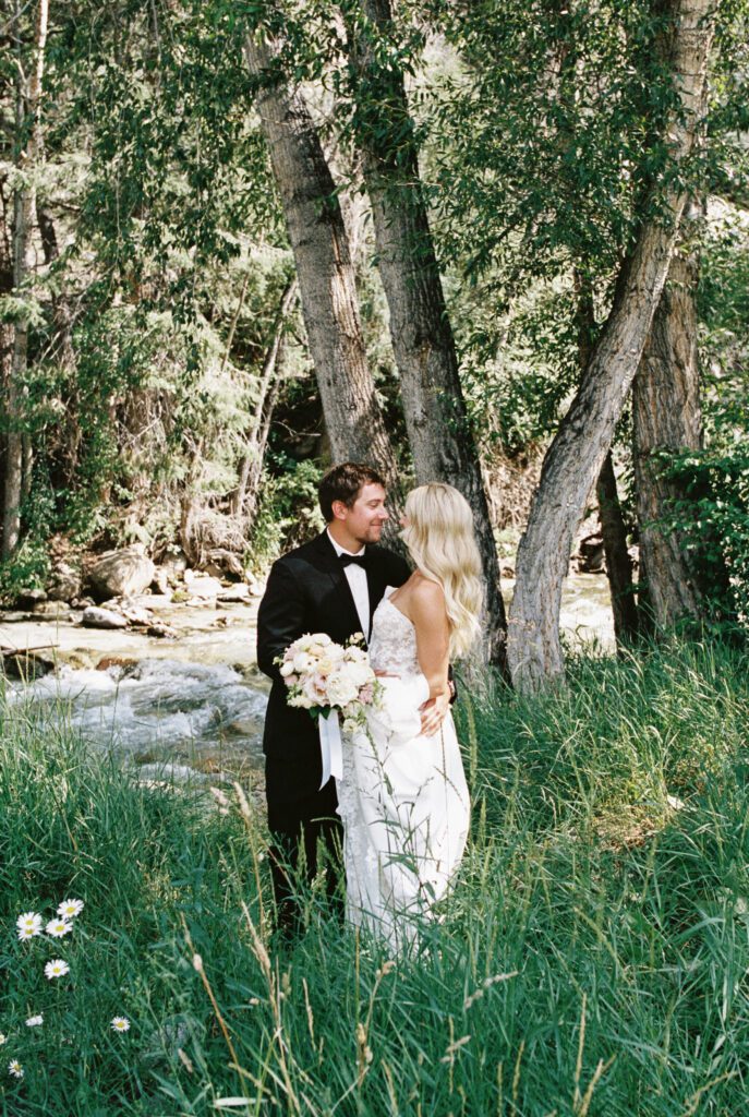 Emotional first look moment with mountain views at Mt. Princeton Hot Springs wedding