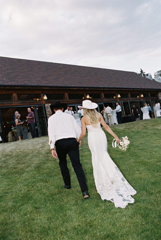 Couple holding hands at sunset at Mt. Princeton Hot Springs wedding