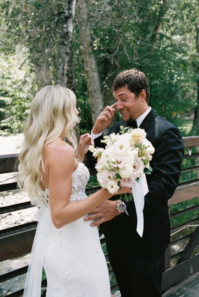 Groom reacting to bride during first look at Mt. Princeton Hot Springs wedding